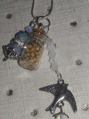 Silver Bird Charm Necklace with Opalescent Beads and Mini Glass Vial